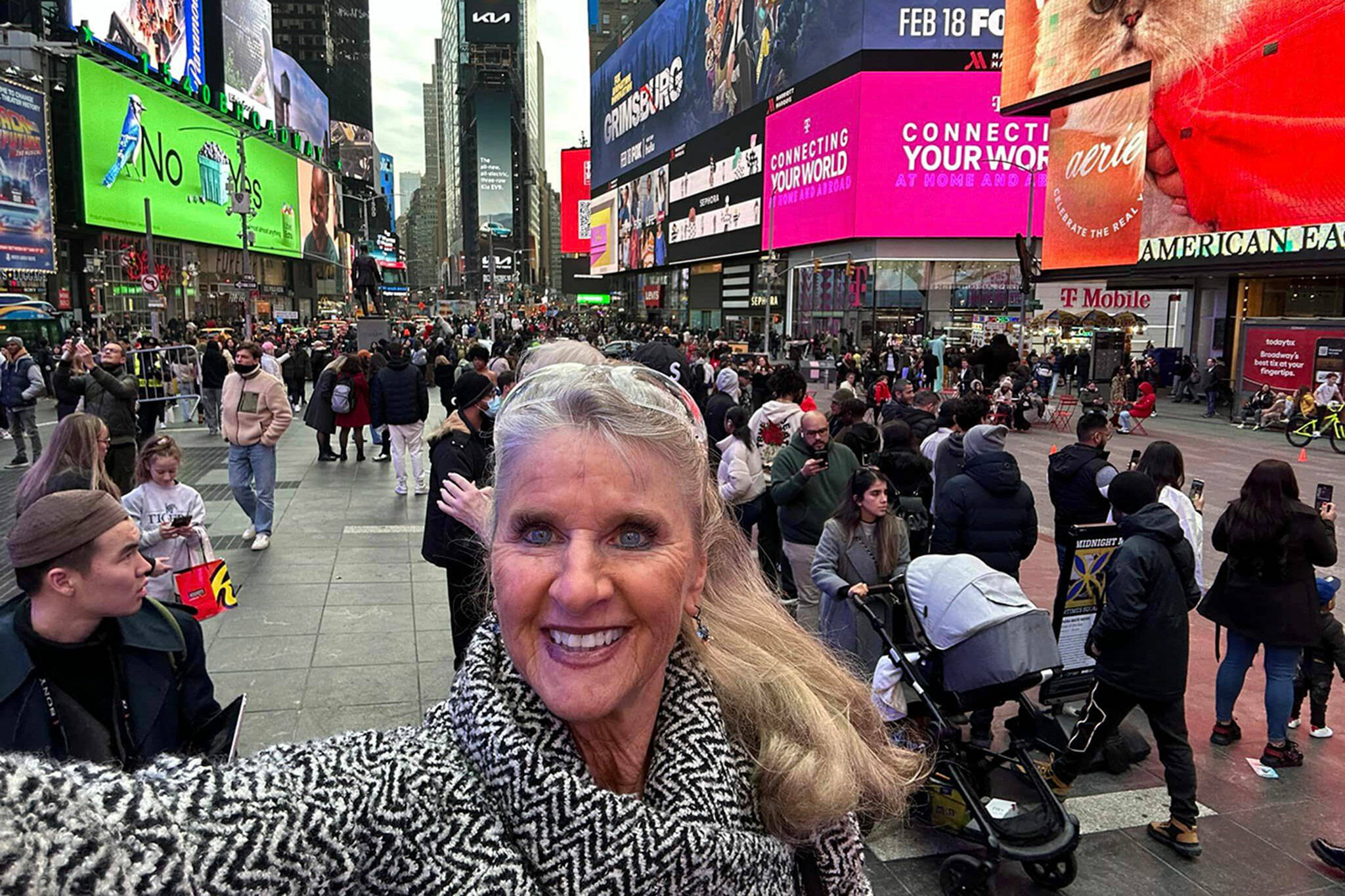 Photo courtesy Captain-Crystal/ Captain-Crystal Stout stands in Times Square earlier in February before participating in three runway shows during New York Fashion Week. She went to the popular attraction to see a billboard featuring her and friend Cherie Kidd of Port Angeles.