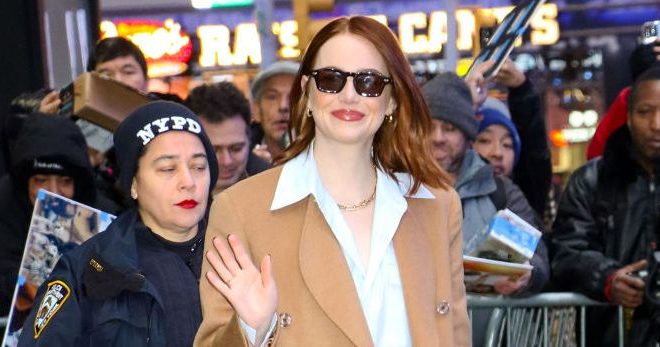 Emma Stone Gives Us Camel Coat Envy In Monochromatic Caramel Tones In NYC