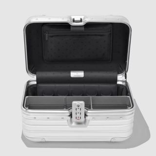 An open Rimowa aluminium vanity case in silver