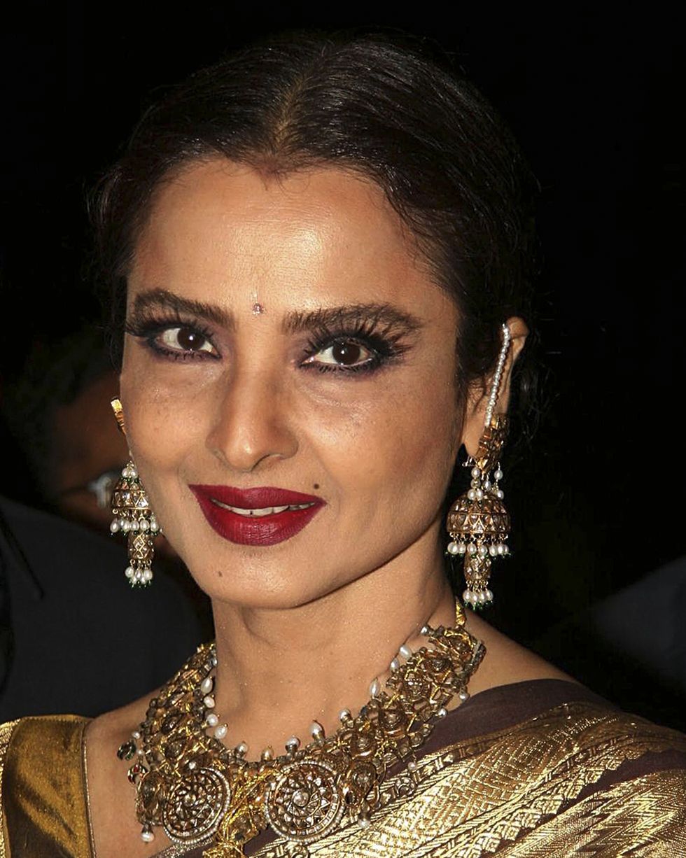indian bollywood actress rekha attends the launch of photographer gautam rajadhyaksh�s marathi coffee table book �chehere� in mumbai on june 18, 2010 afp photostr photo credit should read strafp via getty images