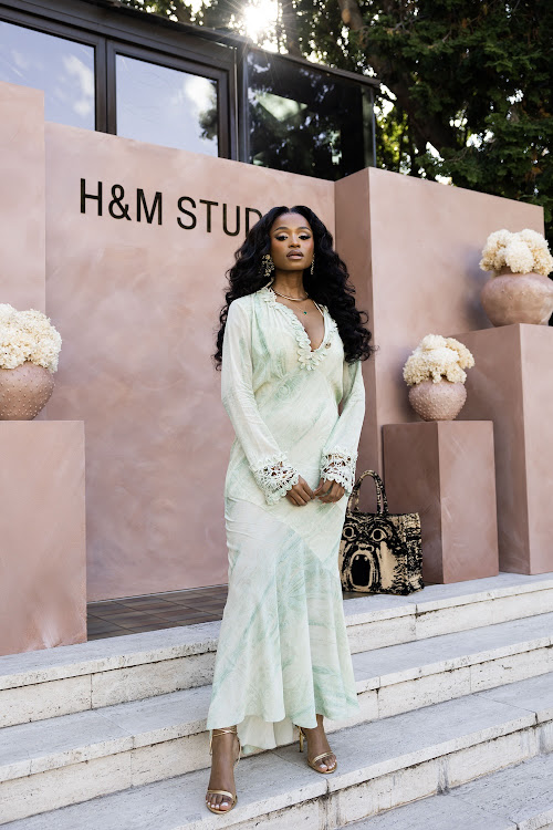 Actor Nomalanga Shozi wears the latest H&M Studio Resort collection in the event in Hyde Park, Johannesburg