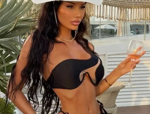 Model dazzles in bikini with sexy cut-outs – but shoppers spot problem