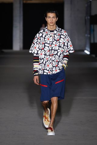 MSGM S/S 2025 men’s runway show featuring male model in floral shirt and shorts