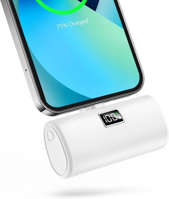 Mini power bank plugged into phone. 