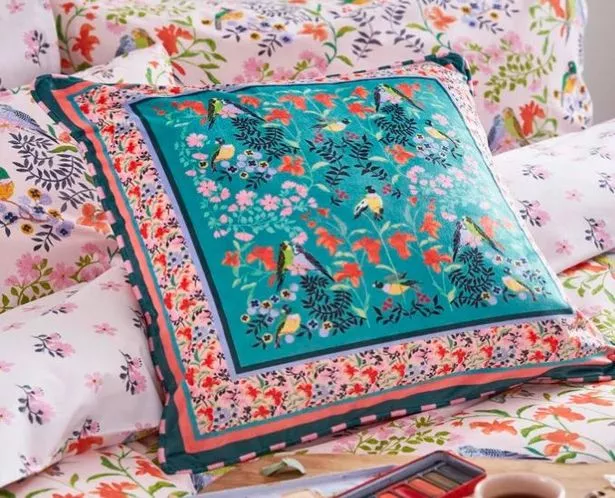 This Cath Kidston pillow will brighten up any space