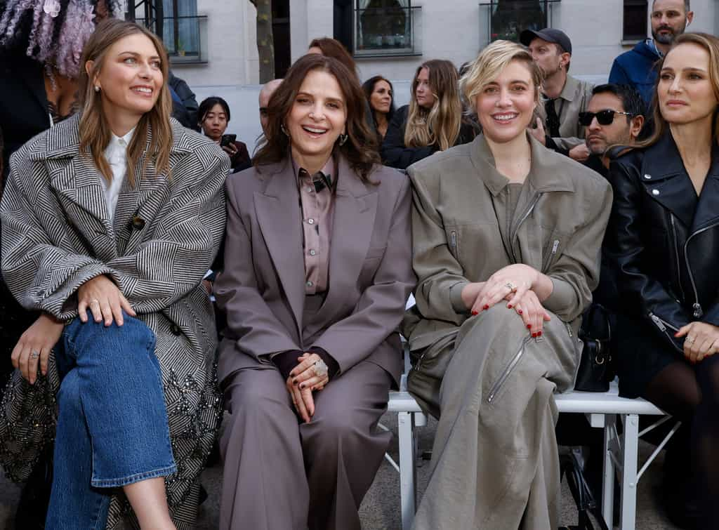 Natalie Portman, Greta Gerwig, Maria Sharapova and more sit in the rain to support Stella McCartney at Paris Fashion Week