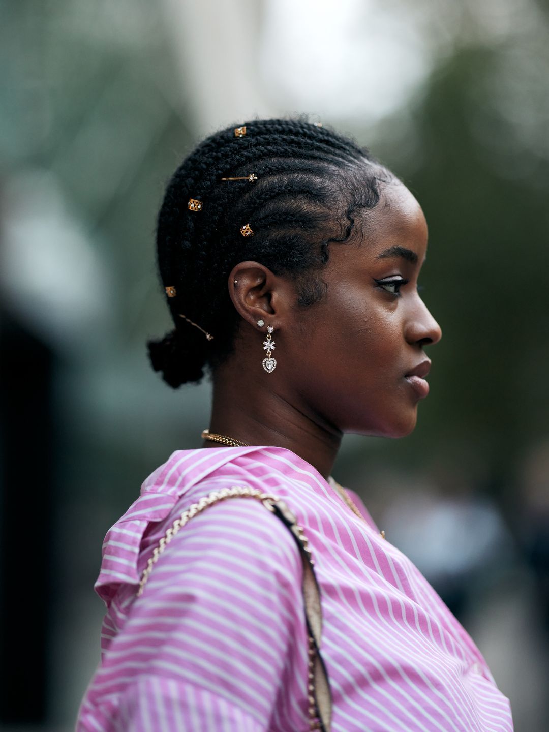 A woman with embellished braids at LFW SS25