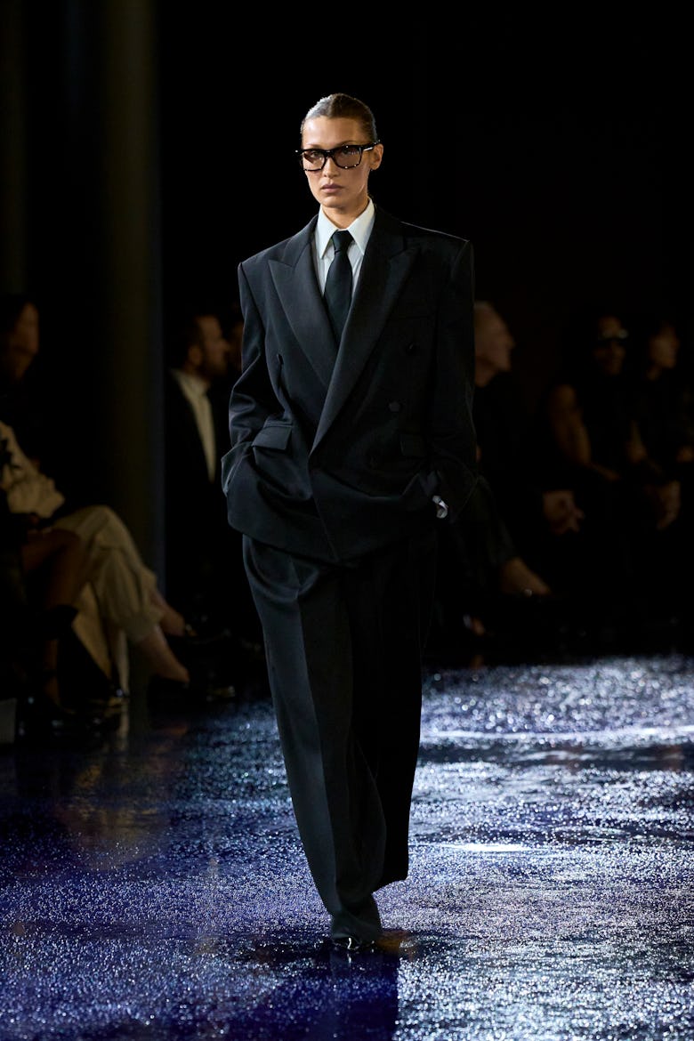 a look from saint laurent spring 2025 collection shown at paris fashion week runway show