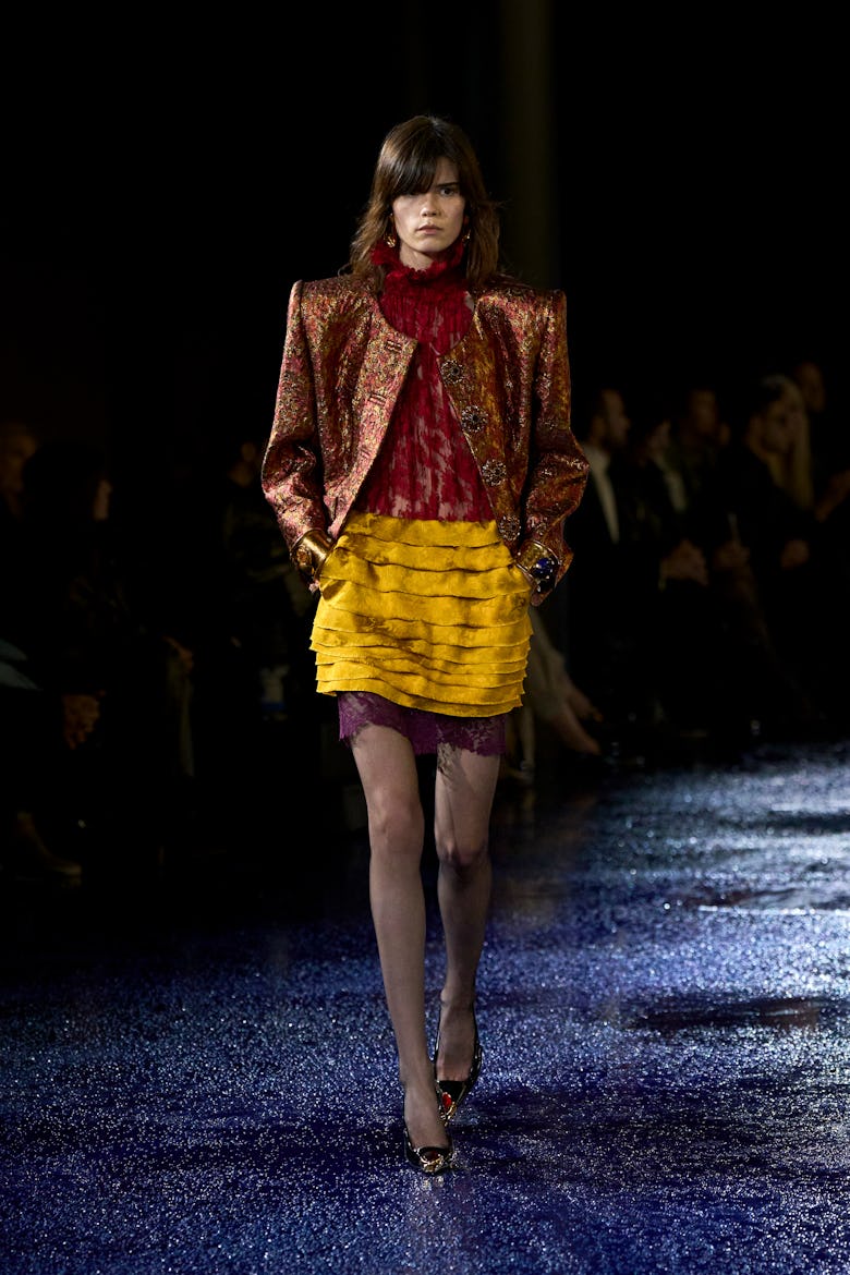 a look from saint laurent spring 2025 collection shown at paris fashion week runway show