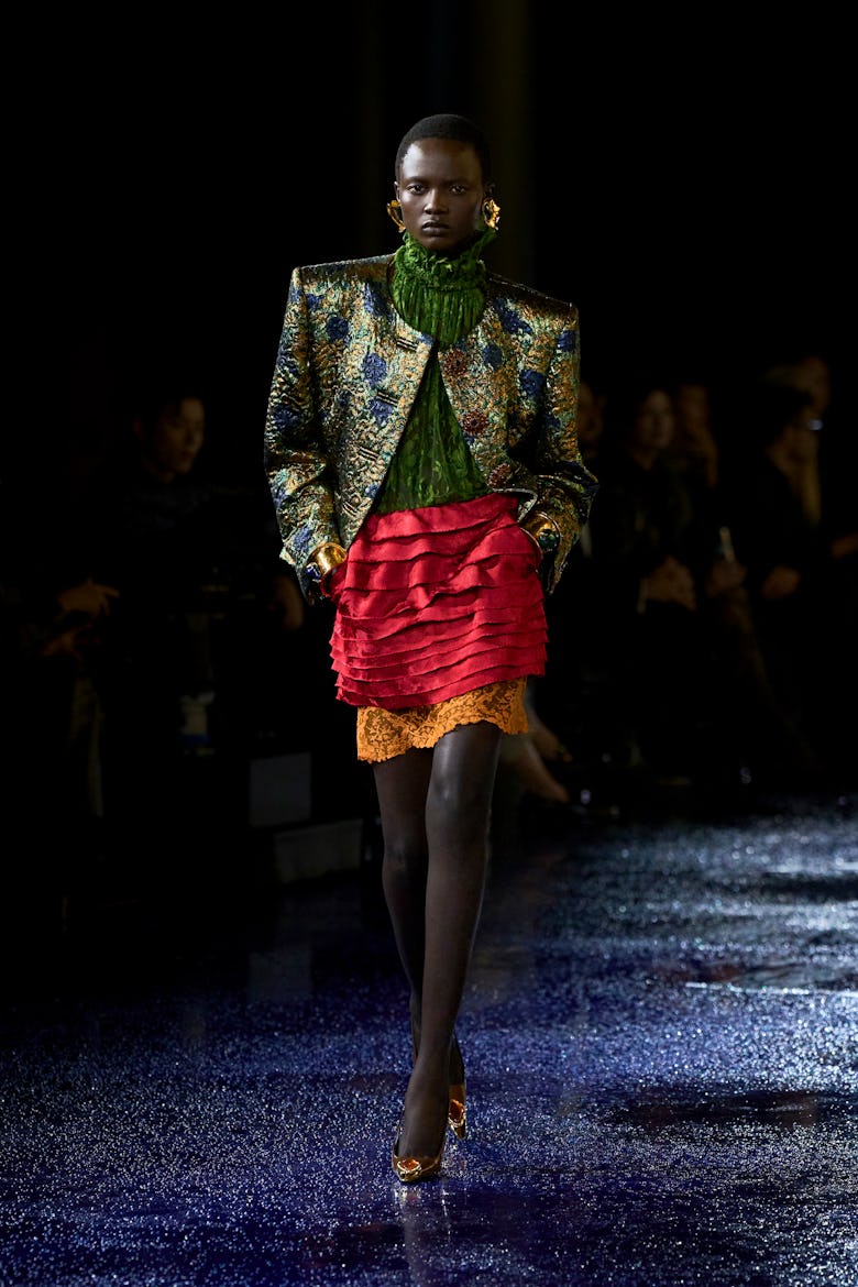 a look from saint laurent spring 2025 collection shown at paris fashion week runway show