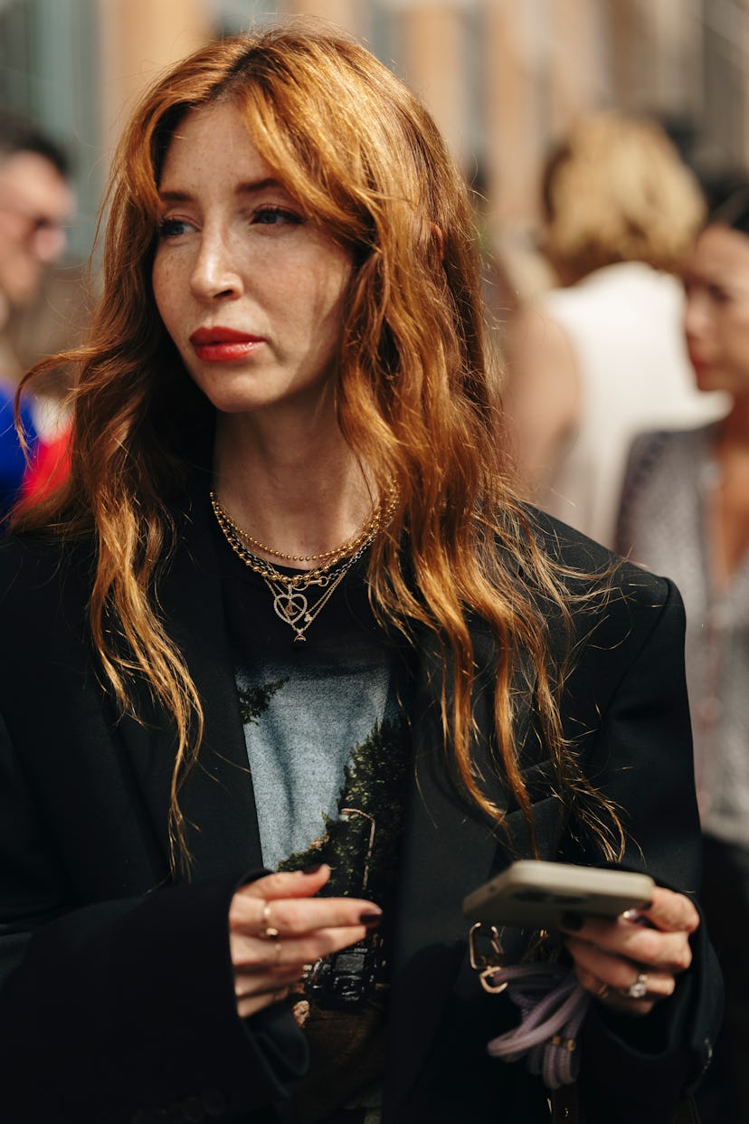 Red lipstick NYFW spring/summer 2025 street style beauty