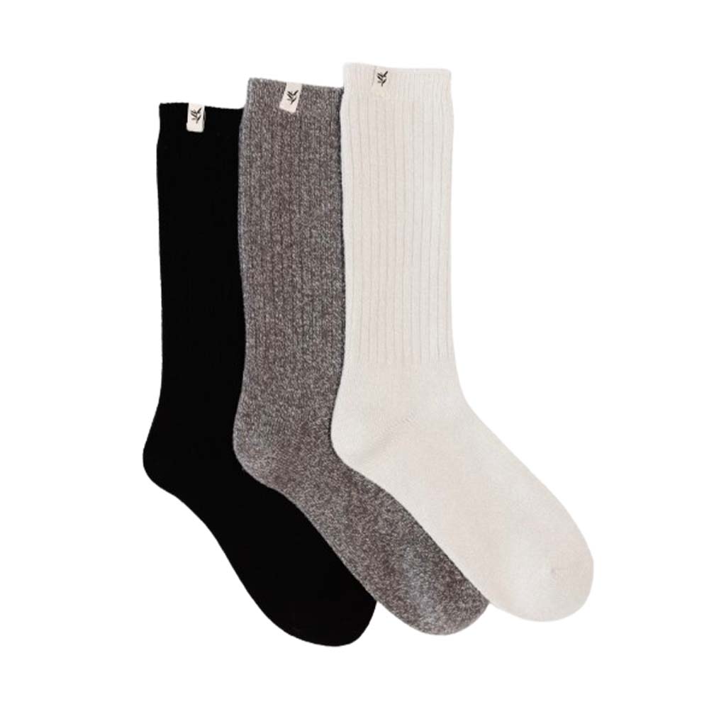 three knit socks in black, brown, and white