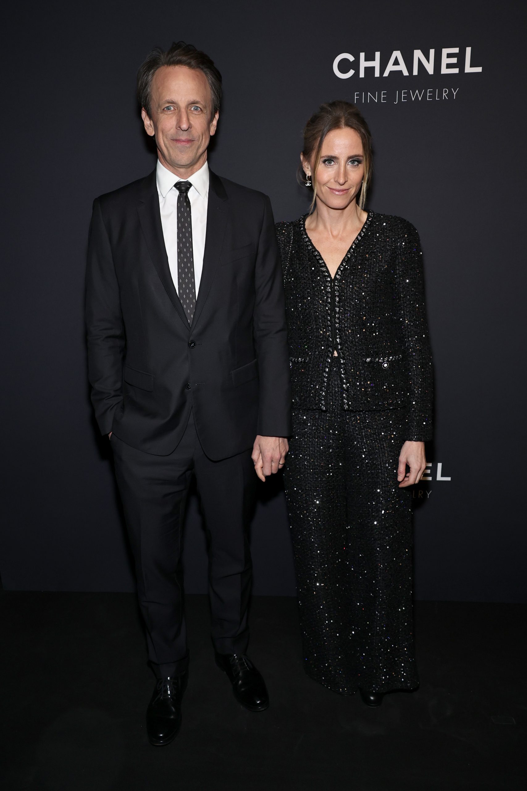 NEW YORK, NEW YORK - FEBRUARY 07: Seth Meyers and Alexi Ashe, wearing CHANEL, attend the CHANEL Dinner to celebrate the Watches & Fine Jewelry Fifth Avenue Flagship Boutique Opening on February 07, 2024 in New York City. (Photo by Jamie McCarthy/WireImage)