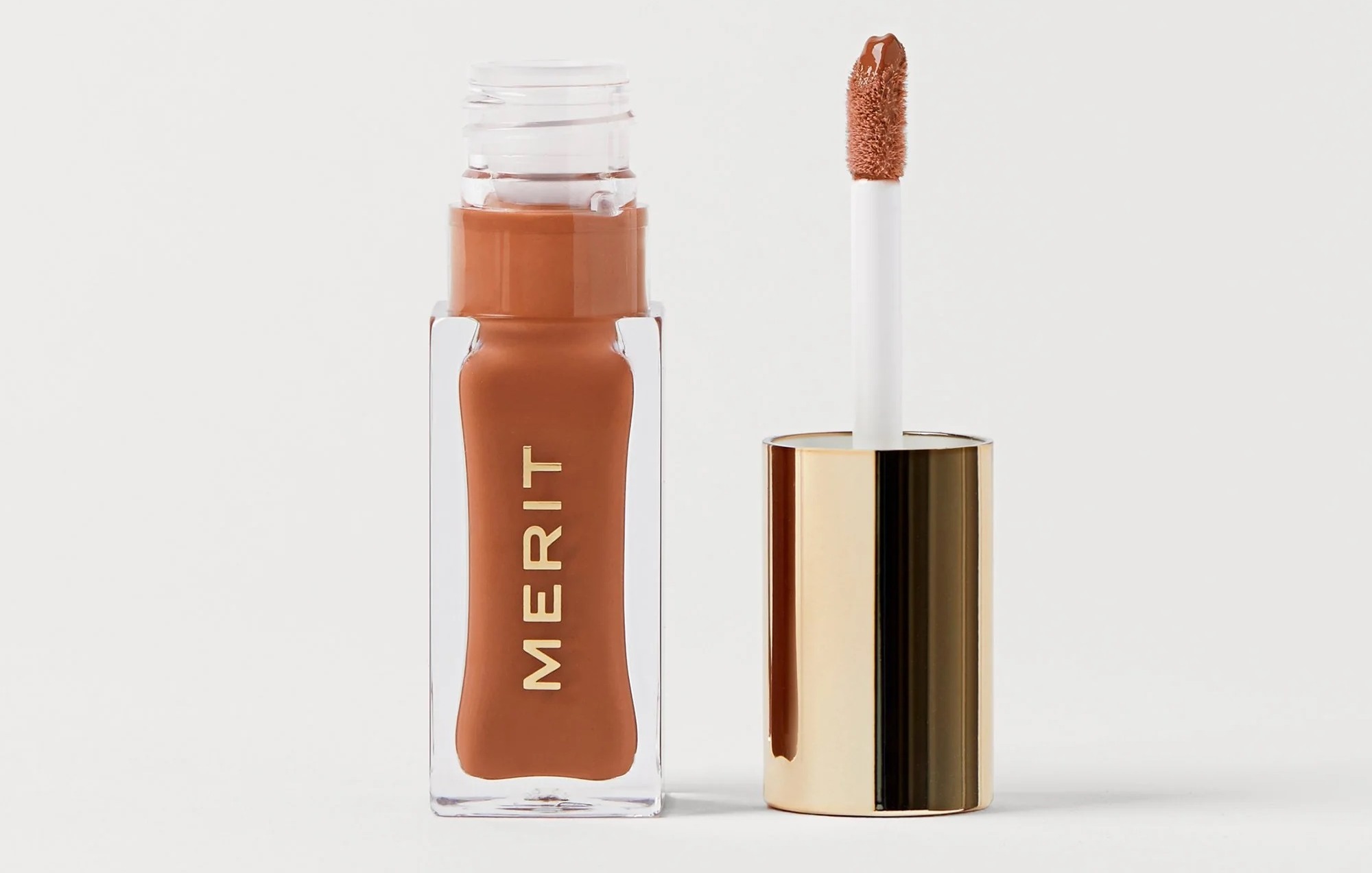 Merit Shade Slick softens and conditions lips