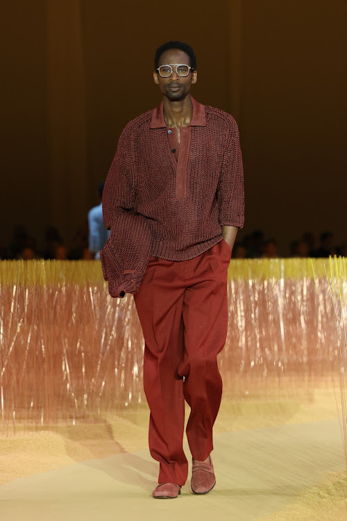 A model walks the runway at the Zegna fashion show during the Milan Menswear Spring/Summer 2025.